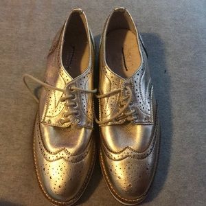 Gold slip ons never worn